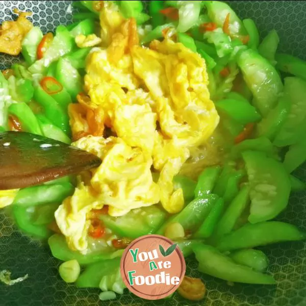 Fried egg with towel gourd