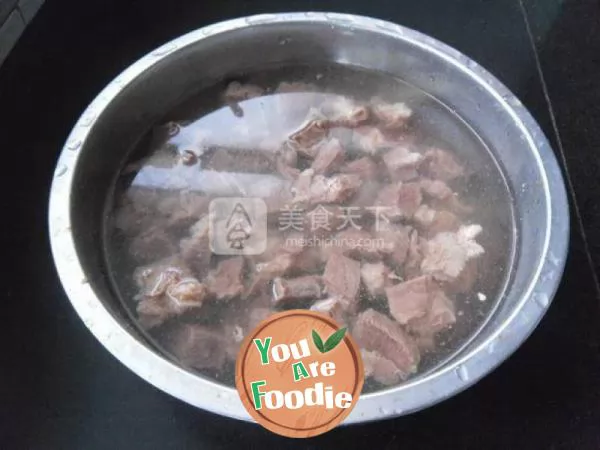 Beef cubes in clear soup