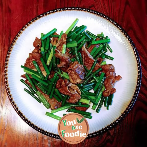 Fried large intestine with garlic sprouts