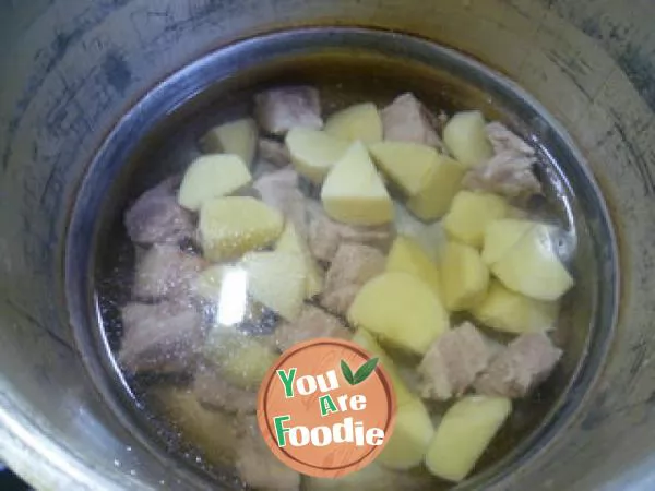 Pork ribs soup with vegetables and potatoes