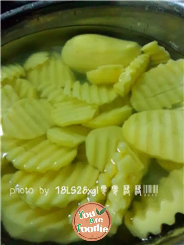 Private dish: potato slices with black pepper