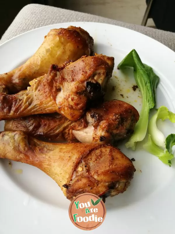 Roasted chicken leg with cumin in oven