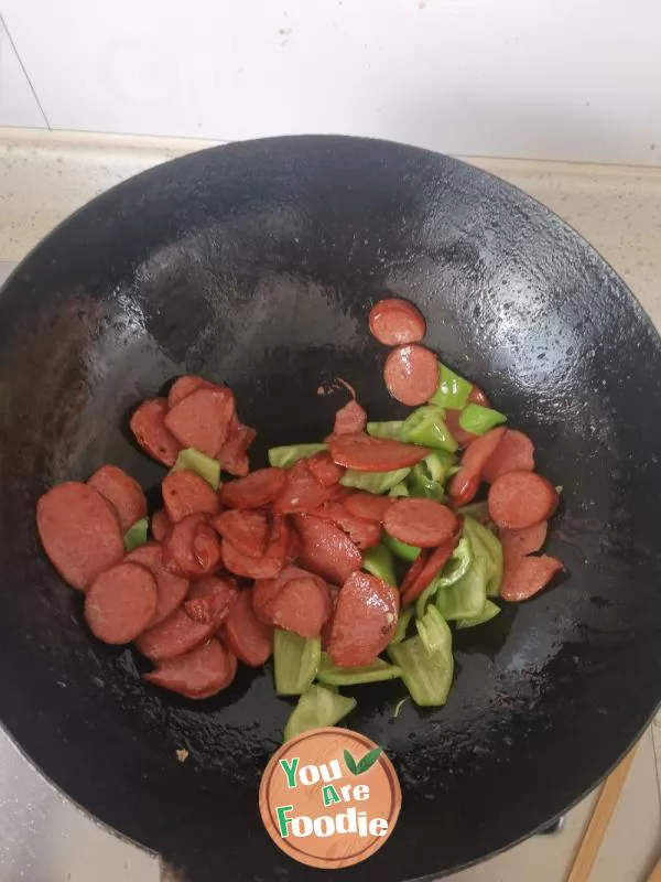 Fried red sausage with peppers