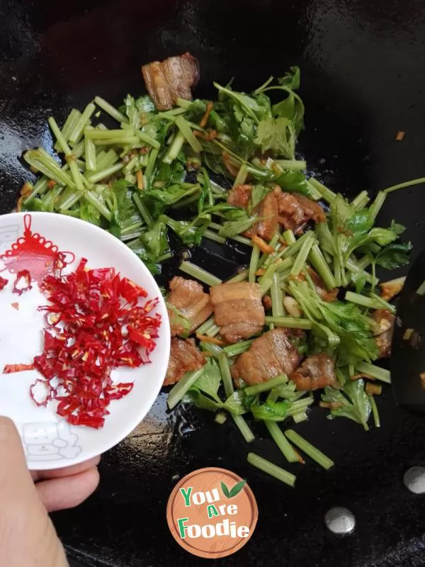 Fried celery with streaky pork