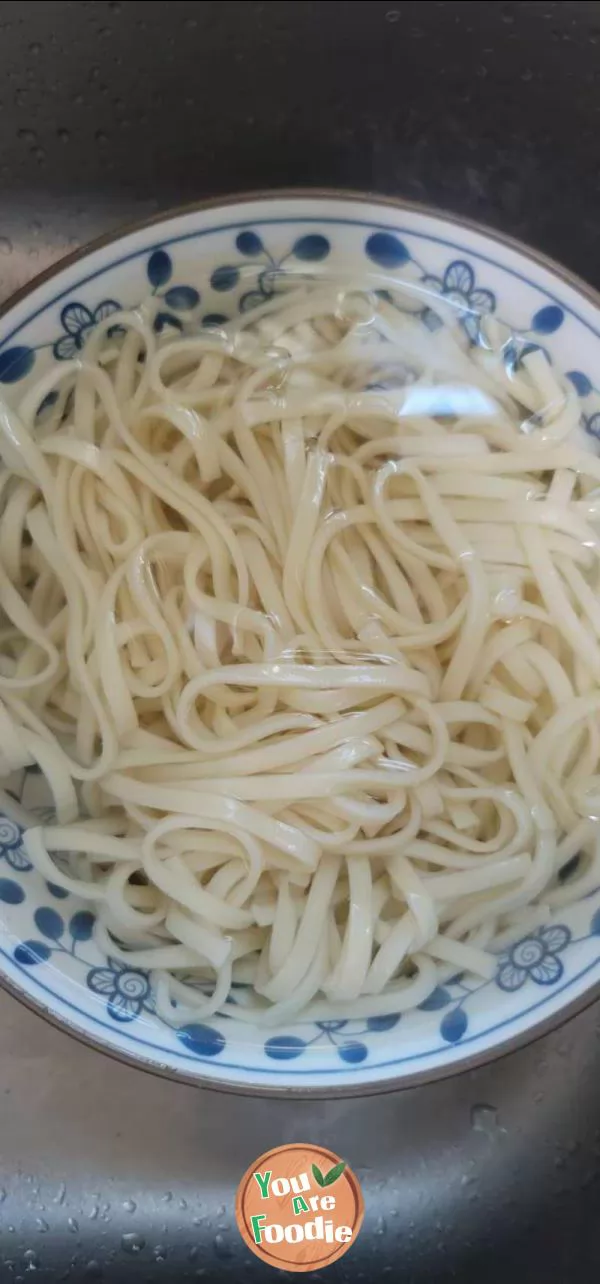 Fried flat noodles with scallion oil