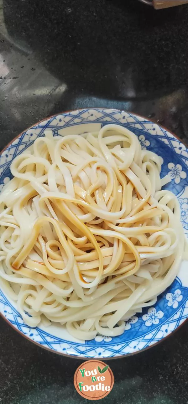 Fried flat noodles with scallion oil