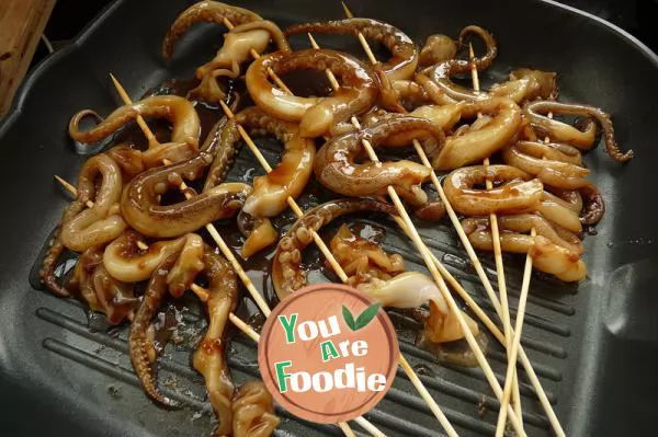 Fried squid whiskers in soy sauce