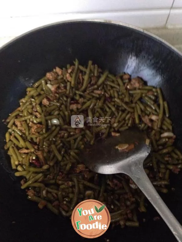 Fried minced meat with pickled beans