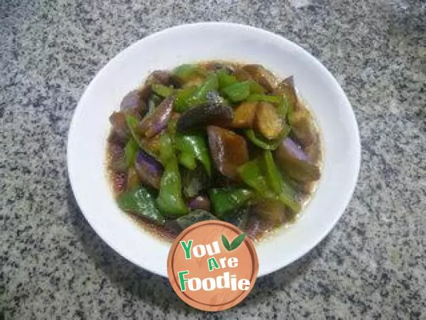 Fried eggplant with green pepper and preserved egg