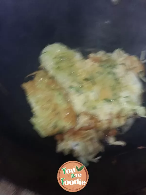 Fried egg with shredded melon