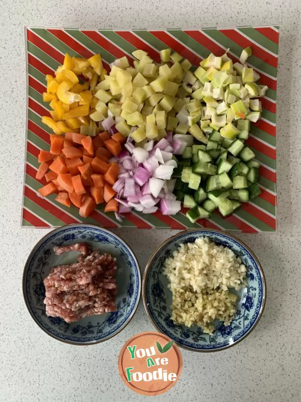 Stir fried diced vegetables with sesame seed and minced meat