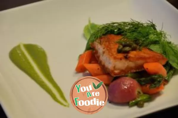 Pan fried salmon and vegetables with salsa Verde