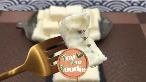 Yogurt and coconut cubes, sour and sweet, refreshing taste, summer snack.