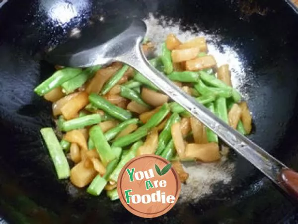 Stir fried plum beans with dried radish