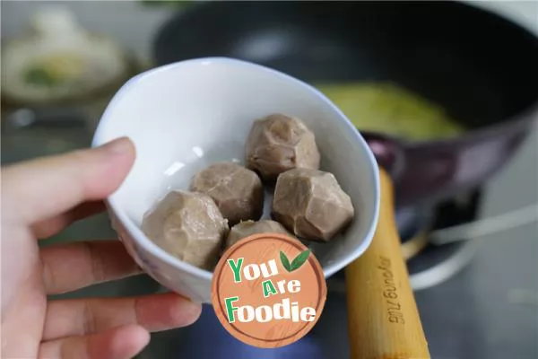 Noodle soup with beef balls and potato wonton