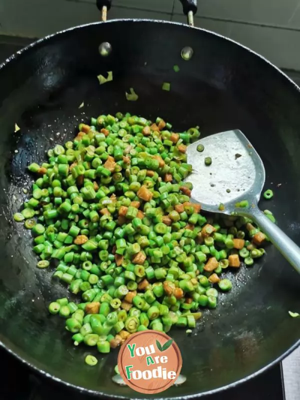 Fried long beans with diced meat