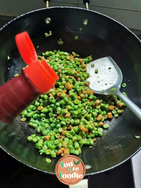 Fried long beans with diced meat