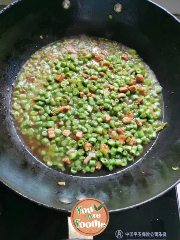 Fried long beans with diced meat