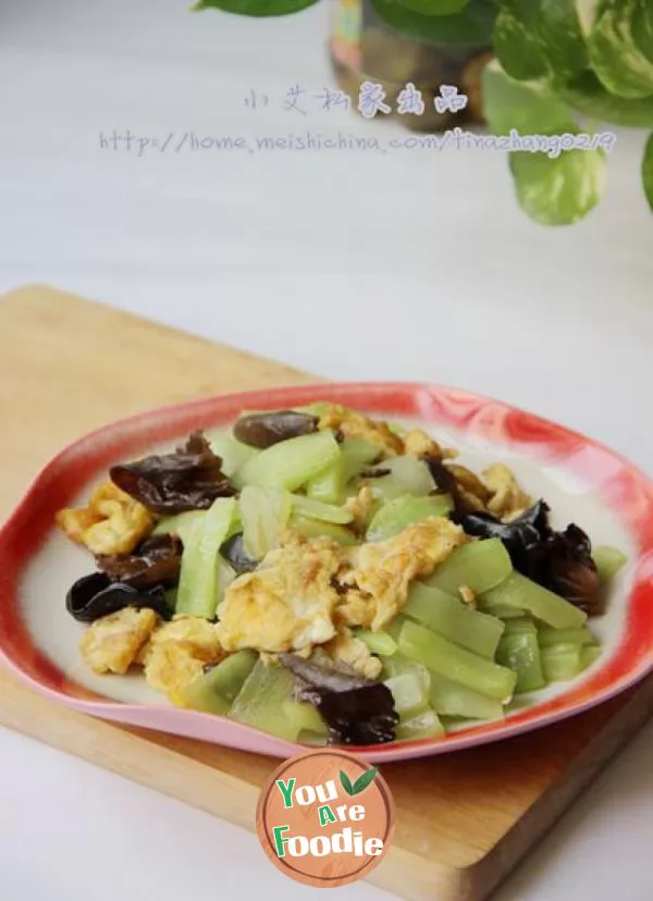 Fried egg with lettuce and agaric