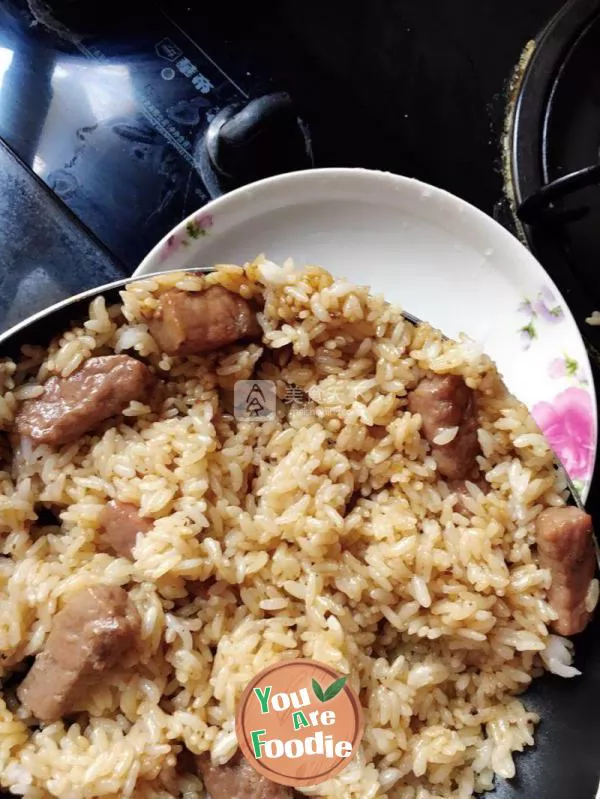 Baked rice with black pepper steak and meat cheese