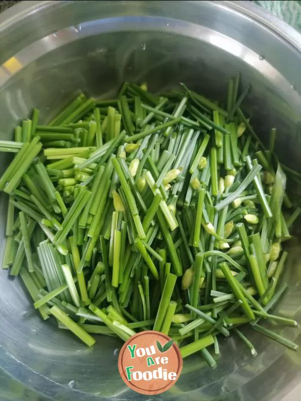 Fried egg with leek flower