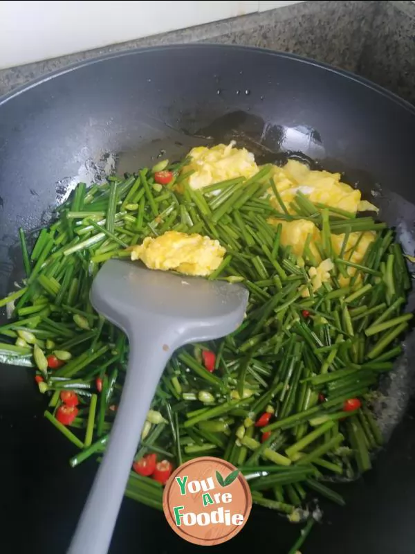 Fried egg with leek flower