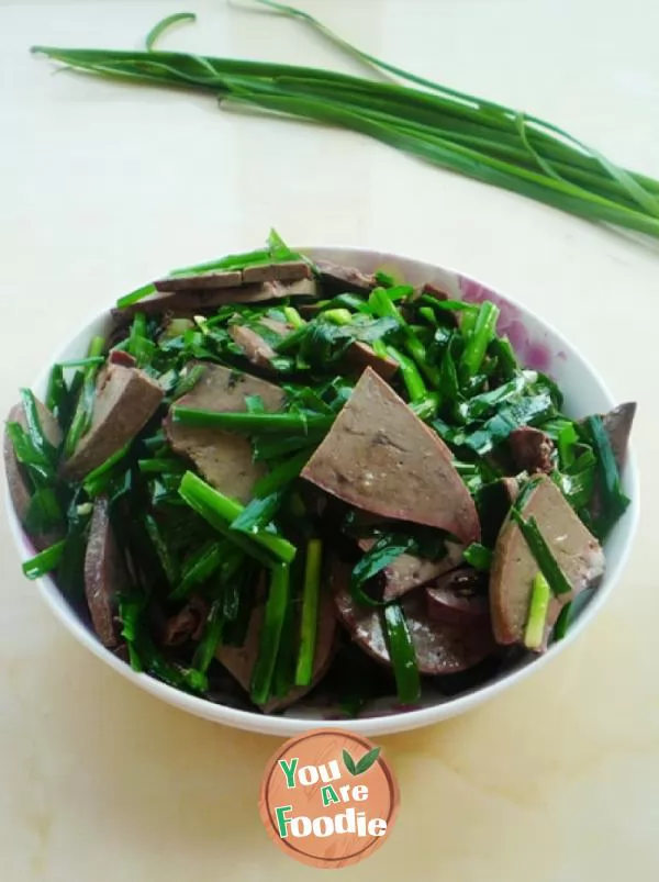 Fried lamb liver with leeks