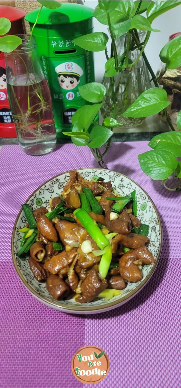 Stir fried large intestine with garlic sprouts