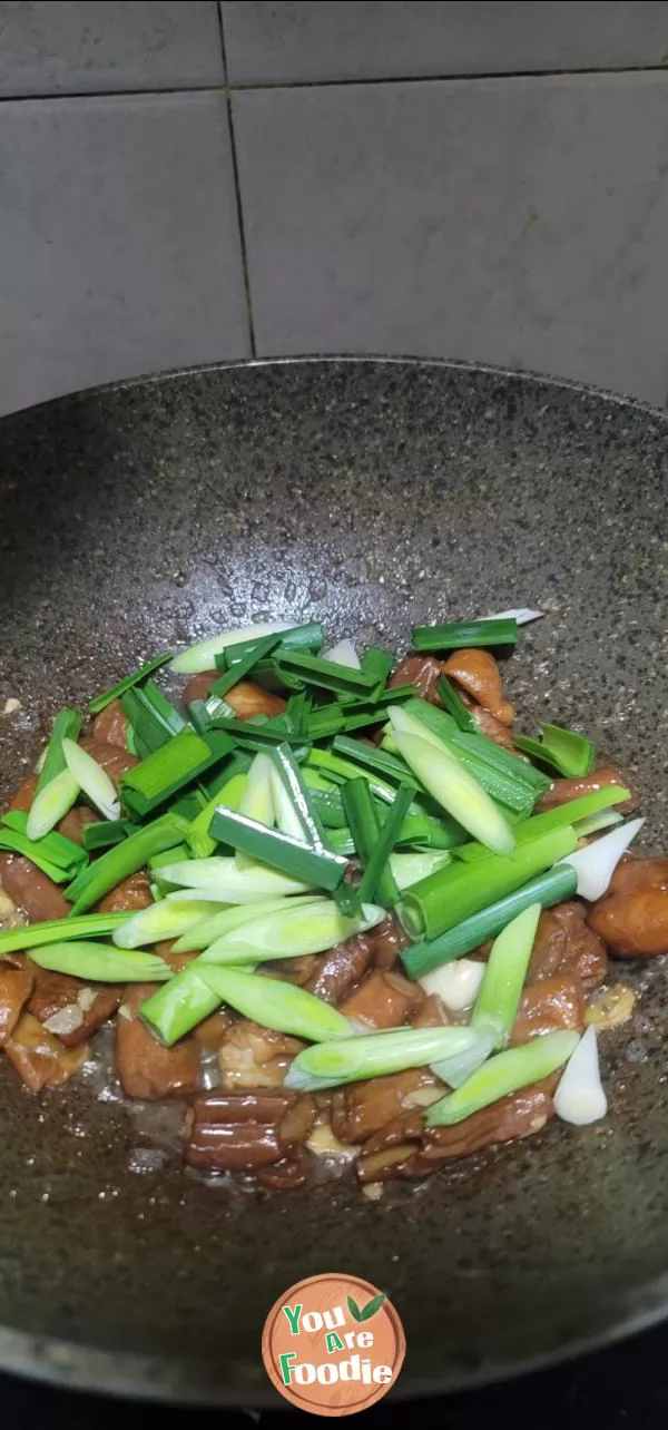 Stir fried large intestine with garlic sprouts