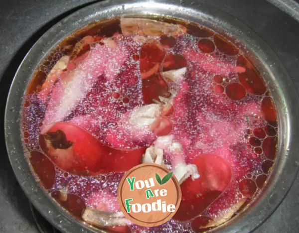Stewed chicken soup with red mushrooms