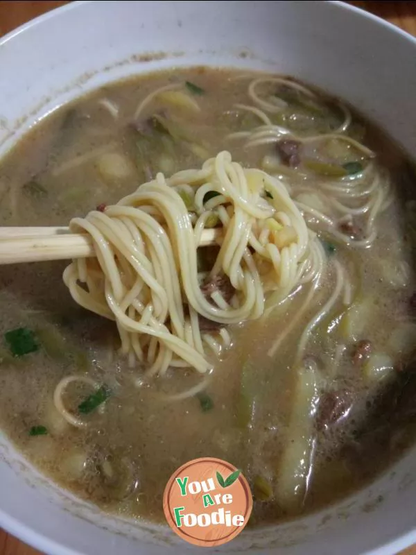 Noodle soup with mutton, potatoes and beans