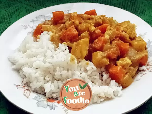 Rice covered with curry seasonal vegetables