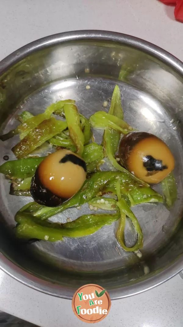 Stir fried Century egg with pepper and eggplant