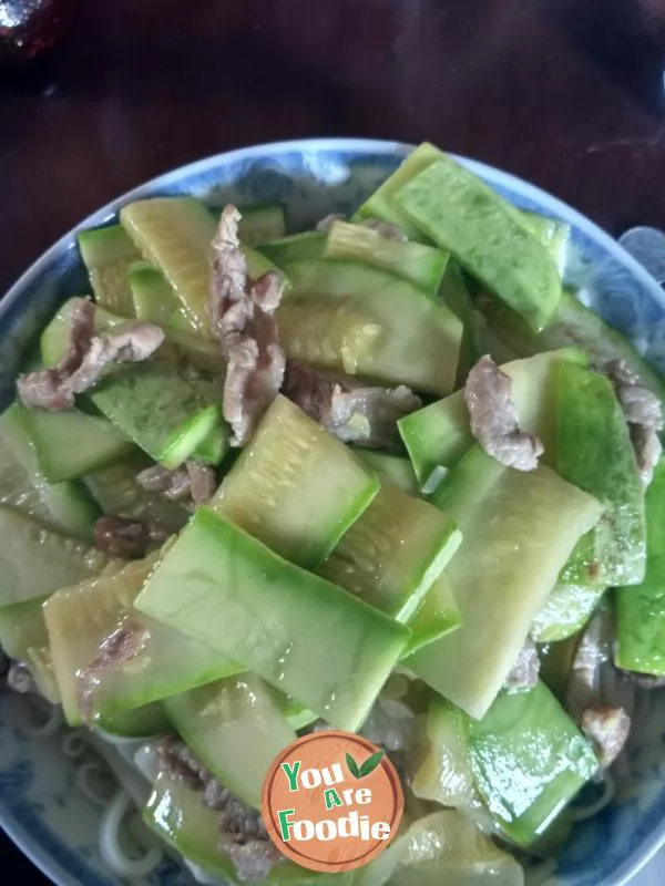 Fried pork noodles with pumpkin