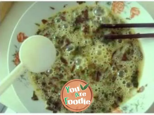 Fried eggs with Chinese toon sprouts