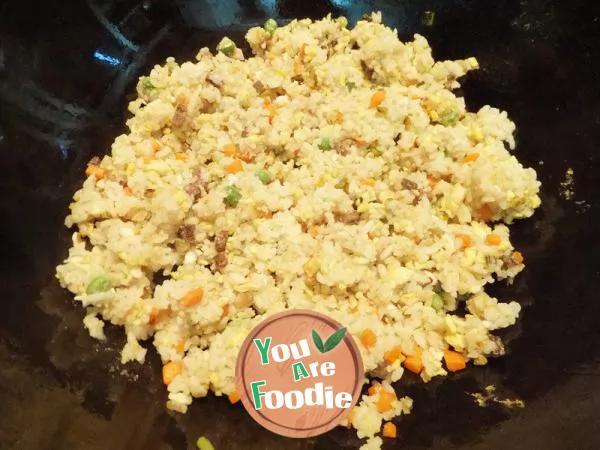 Fried rice with sausage, carrot and egg