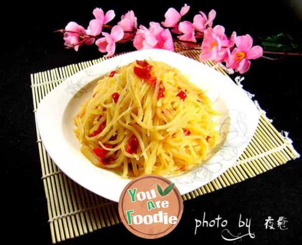 Home cooked dish - shredded potato with chopped pepper