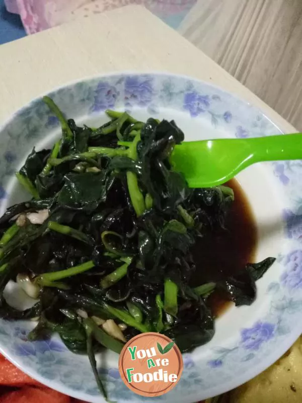 Stir fried Guanyin dish with minced garlic