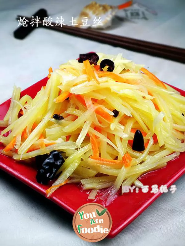 Kwai dish on holiday table -- stir fried shredded potato with hot and sour sauce