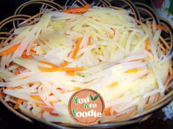 Kwai dish on holiday table -- stir fried shredded potato with hot and sour sauce