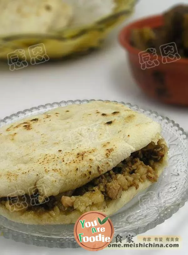 Steamed meat in white sauce